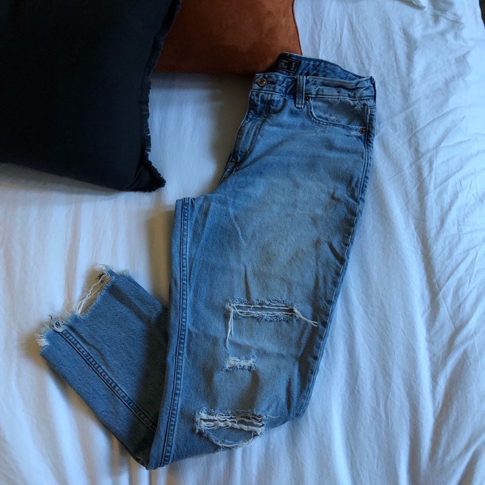 High rise distressed jean
